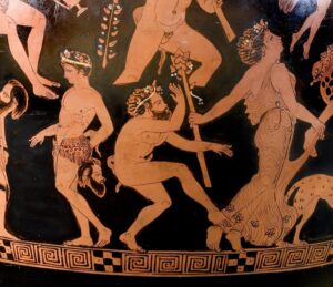 Vaso di Pronomos Cratere a volute attico a figure rosse Pittore di Pronomos, 400 a.C. circa alt. max 73,5 cm; diam. orlo 33,4; diam. piede 21,6 cm Particolare con un membro del coro in abiti di satiro che dà le spalle a un satiro e a una menade danzante Museo Archeologico Nazionale di Napoli